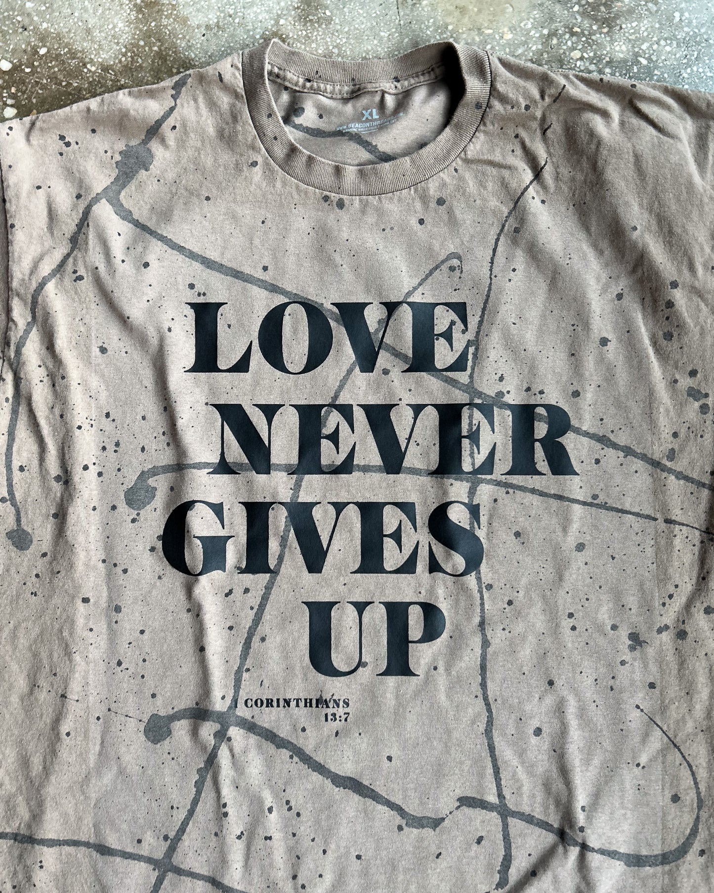 Love Never Gives Up (Splatter) Adult Box T-Shirt
