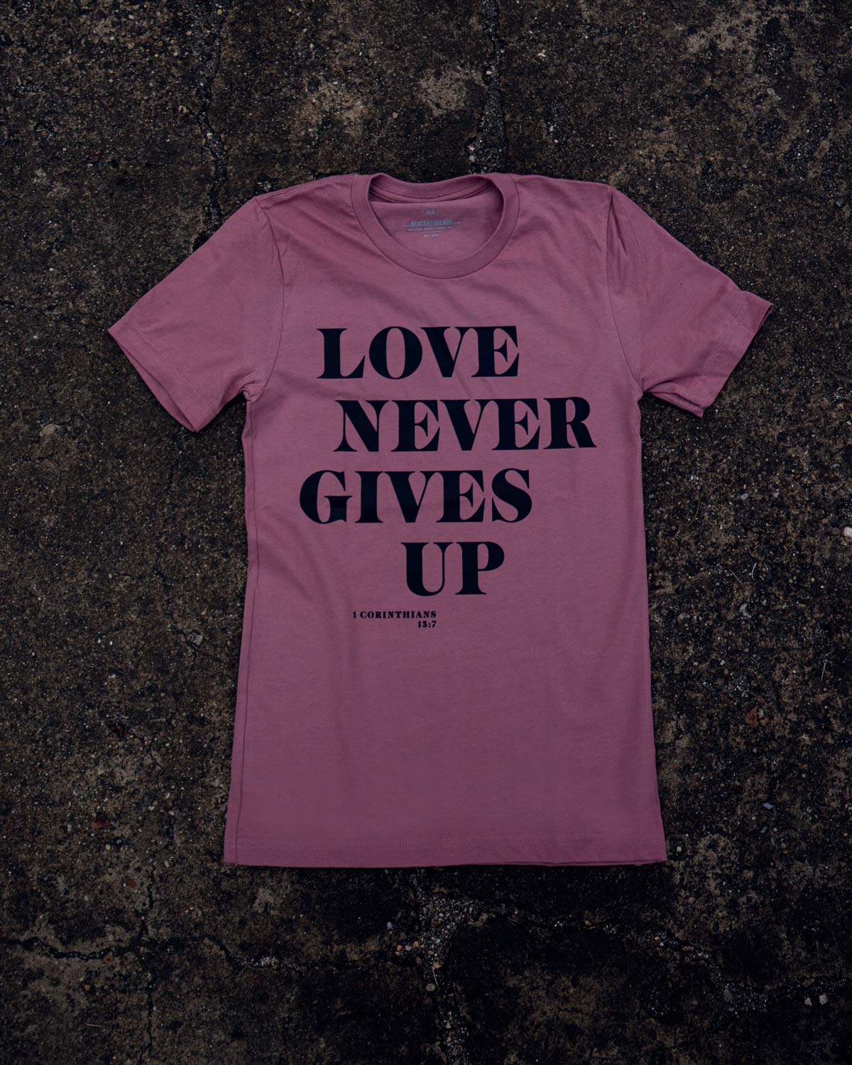 Love Never Gives Up Adult Box T-Shirt
