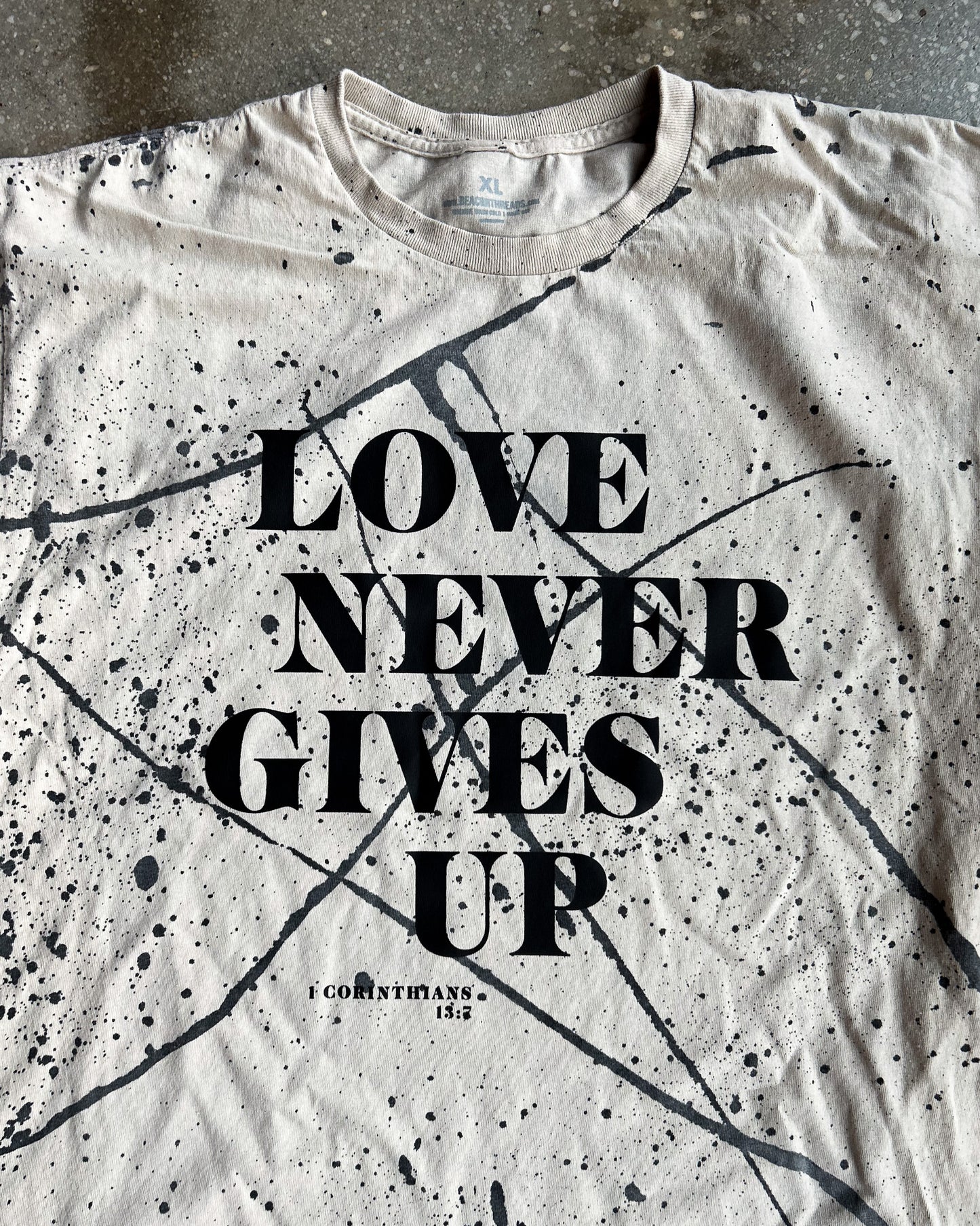 Love Never Gives Up (Splatter) Adult Box T-Shirt