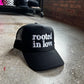 Rooted In Love Trucker Hat