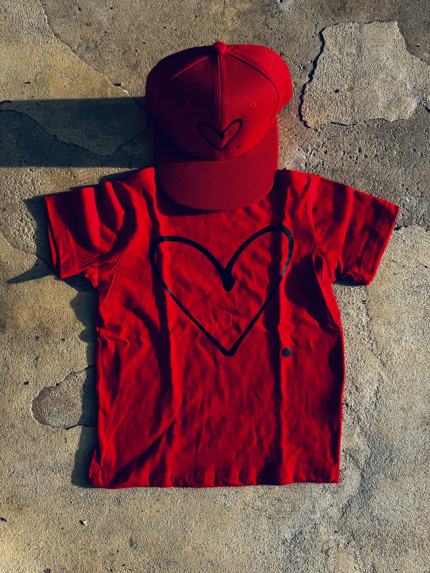 Love Period Kids T-Shirt & Red Snapback Bundle