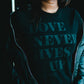 Love Never Gives Up (BLKonBLK) Adult Box T-Shirt