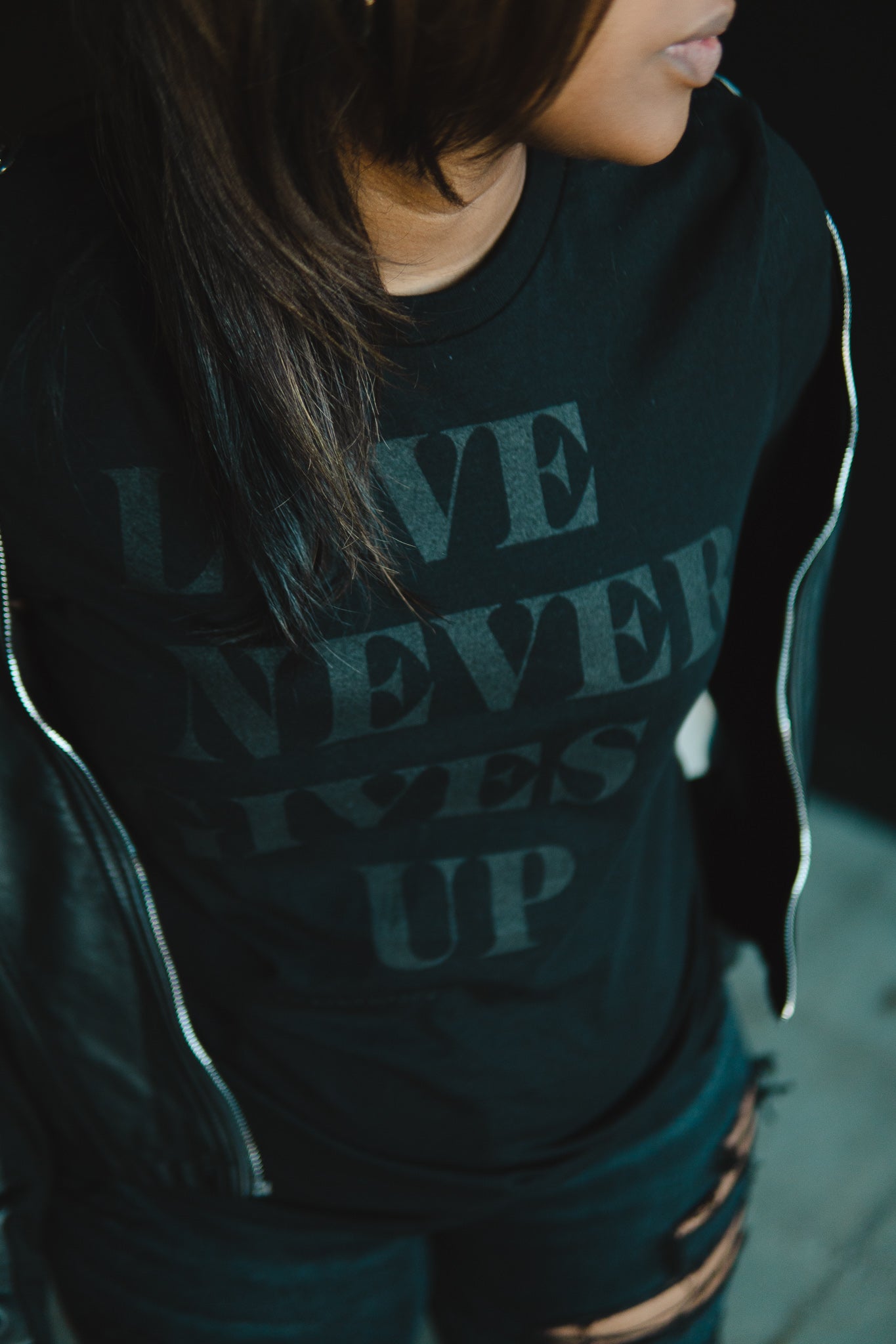 Love Never Gives Up (BLKonBLK) Adult Box T-Shirt