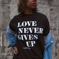 Love Never Gives Up This Adult Drop Shoulder Sweatshirt