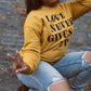 Love Never Gives Up This Adult Drop Shoulder Sweatshirt